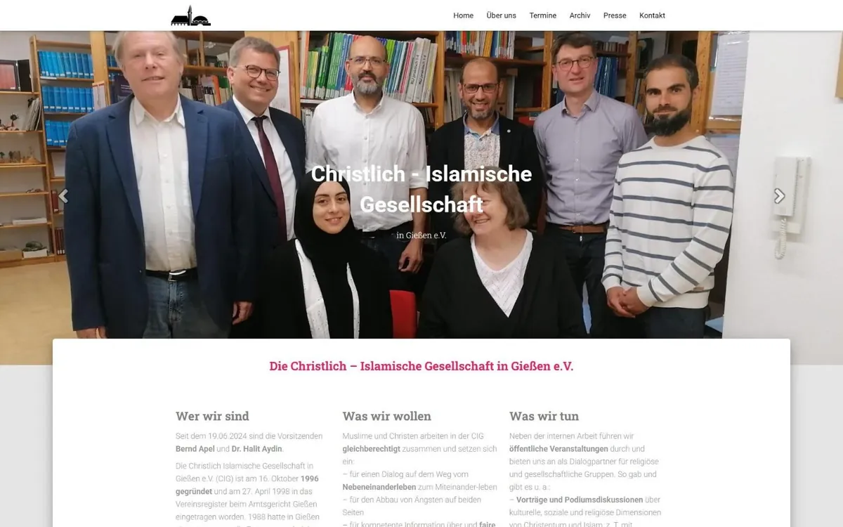 Startseite von cig-giessen.de mit Menü, Gruppenfoto des Vorstands vor Bücherregalen und dem Vereinsnamen